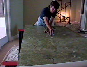 cutting the faux tile